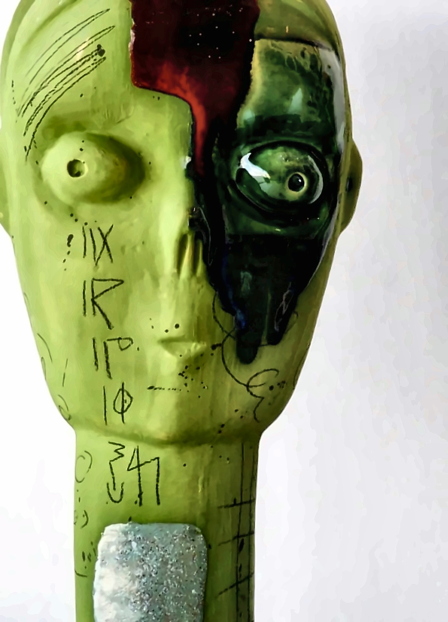 A green ceramic work by Hazem Al-Zubi.