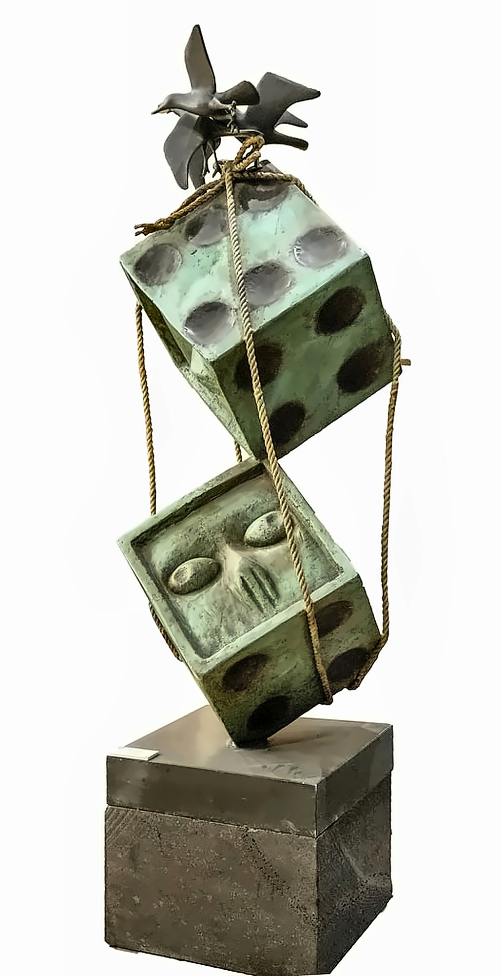Two large bronze dice, one balanced on the other, bound together with rope, a bird alighting on the top.
