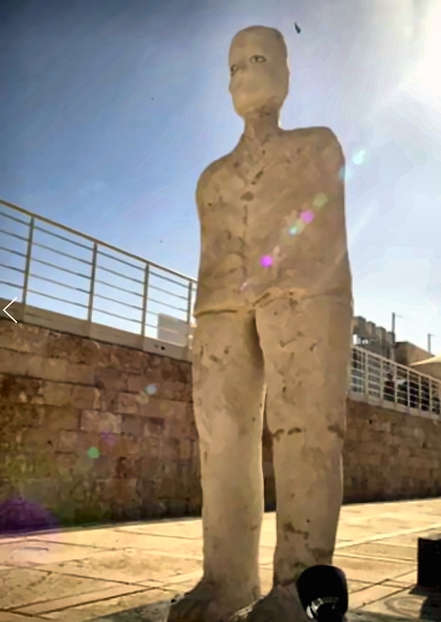 A full limestone figure by Hazem Al-Zubi.