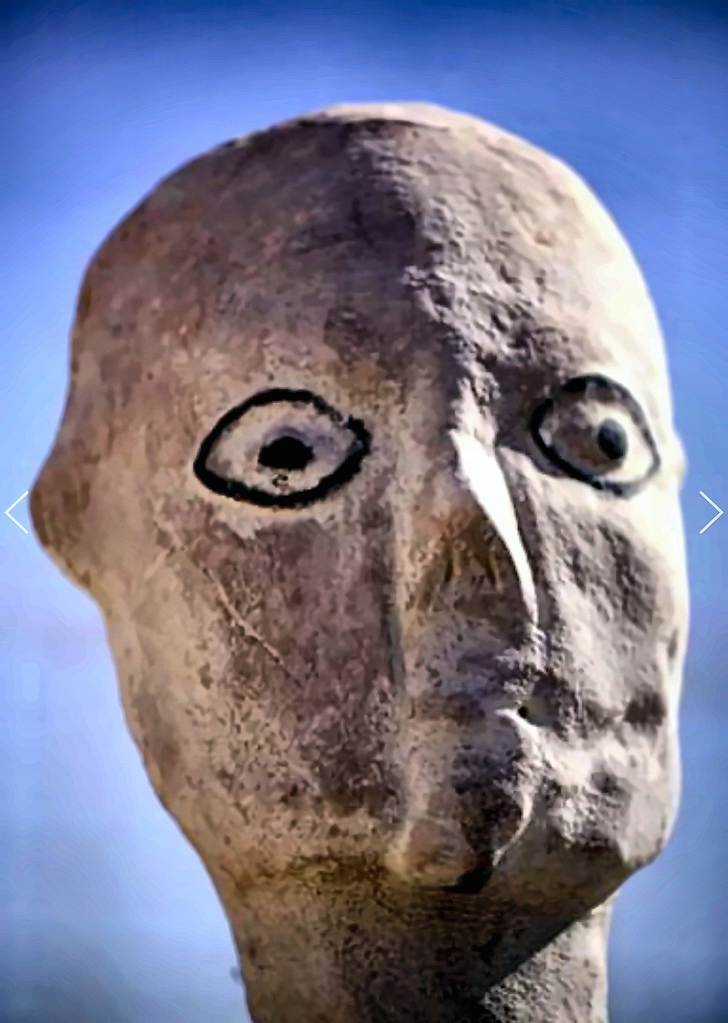 A limestone head by Hazem Al-Zubi.