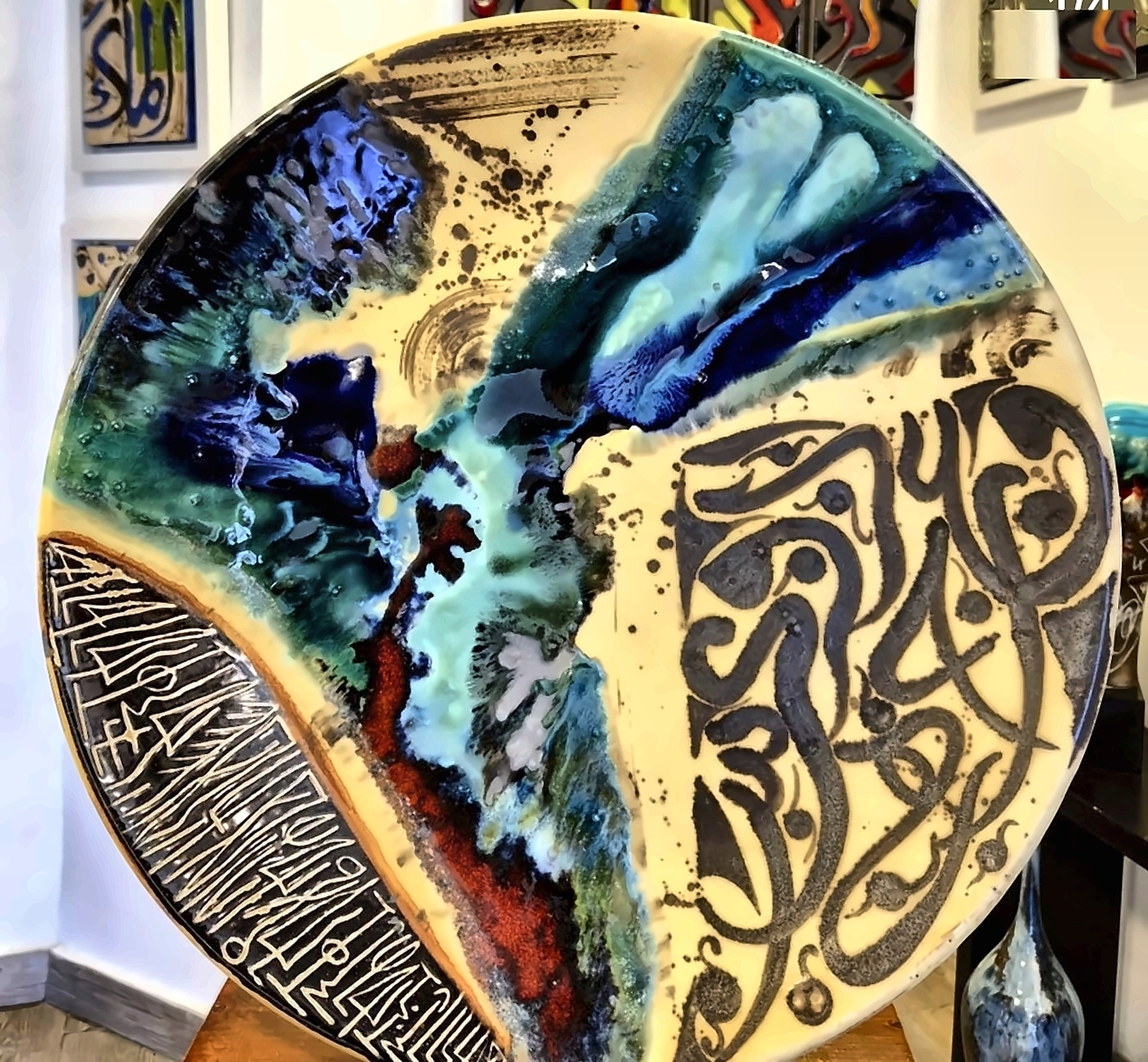 Plate. Glazed and incised ceramic, thrown on the wheel.